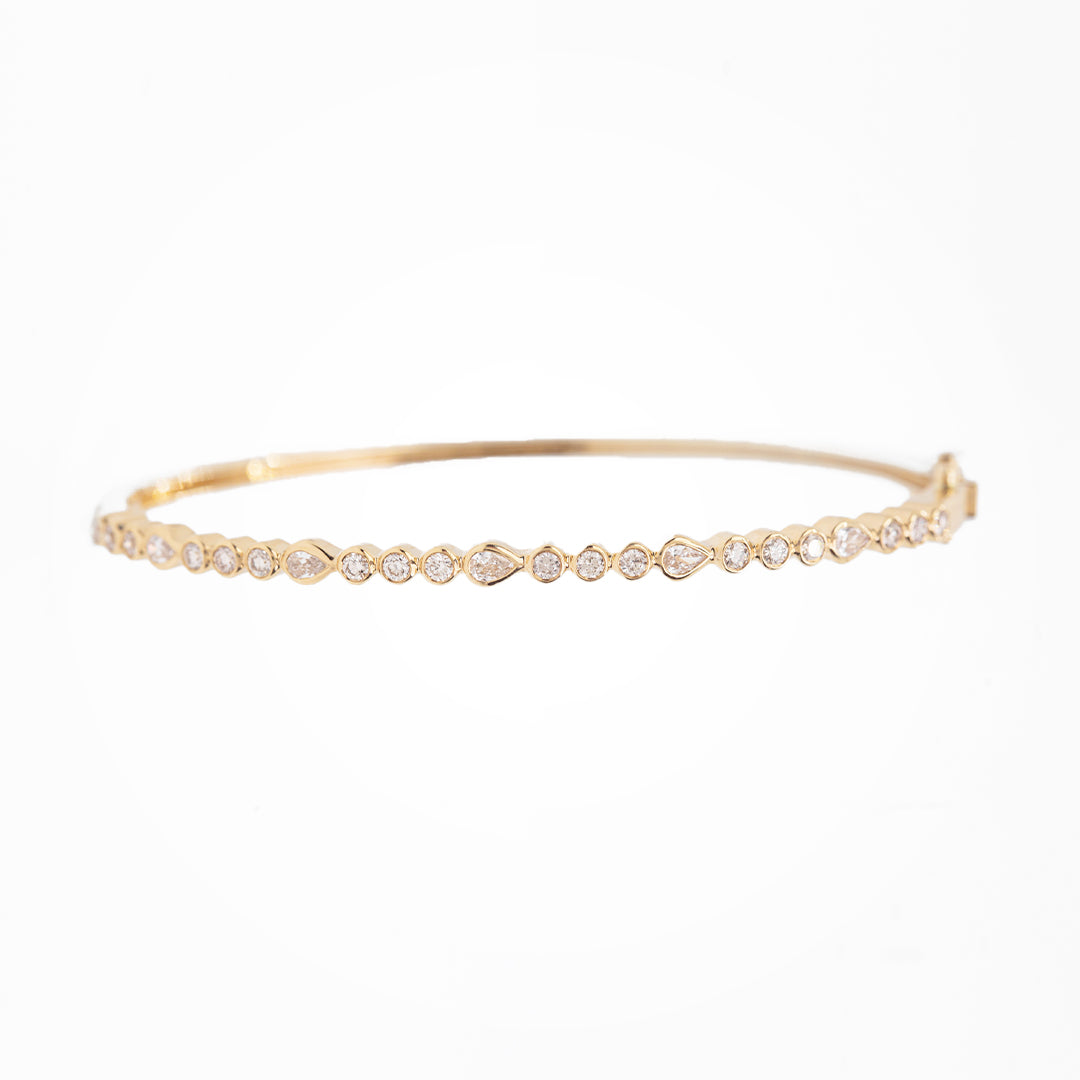 Pear and Round Diamond Bezel Set Bracelet
